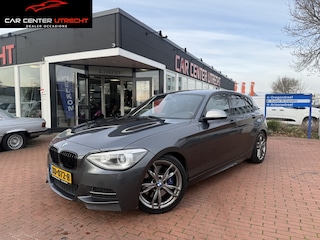 BMW M135i Executive | €250,- KORTING | navi airco automaat