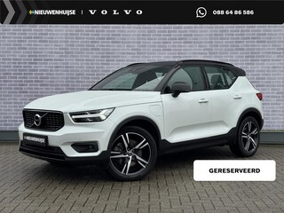 Volvo XC40 Plug-in Hybrid T5 R-Design | Adaptive cruise control | Harman Kardon audio | Stoel- en stuurverwarming | Elektrische stoelverstelling | Achteruitrijcamera | Voorruitverwarming | Parkeersensoren voor + achter | Dode hoek detectie BLIS |