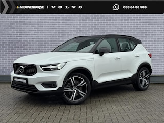 Volvo XC40 Plug-in Hybrid T5 R-Design | Adaptive cruise control | Harman Kardon audio | Stoel- en stuurverwarming | Elektrische stoelverstelling | Achteruitrijcamera | Voorruitverwarming | Parkeersensoren voor + achter | Dode hoek detectie BLIS |