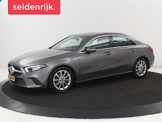 Mercedes-Benz A-klasse 180 Advantage | Stoelverwarming | Carplay | Half leder | Widescreen | Navigatie | Park Assist | Full LED | DAB | Camera | Navigatie | Climate control | Cruise control | Bluetooth