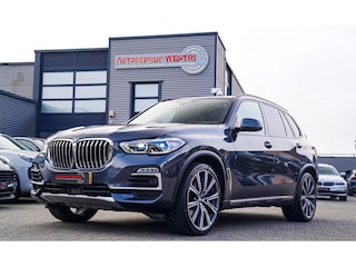 BMW X5 XDrive40i High Executive | Skylounge Pano | Massage | LASER LED | Swarovski Krystal Pook | 22 inch | Elektrische trekhaak |