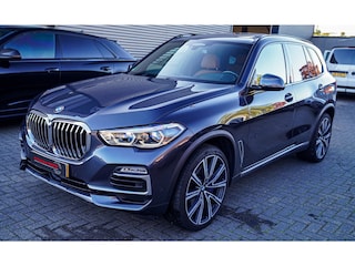 BMW X5 XDrive40i High Executive | Skylounge Pano | Massage | LASER LED | Swarovski Krystal Pook | 22 inch | Elektrische trekhaak |