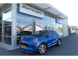 Ford Puma 1.0 EcoBoost Hybrid Titanium X TREKHAAK AFNEEMBAAR (1.100KG), WINTER PACK, ADAPT. CRUISE, CLIMA, NAVI, CAMERA, PDC V&A, APPLE CARPLAY/ANDROID AUTO, BLIS, B&O, LANE ASSIST, 92.386KM