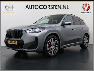 BMW X1 xDrive30e AUT-7 327pk 4WD Leer Pano-Dak/Hef-Dak Sport-Stoel+Elektr.+Geheugen+Verwarmd M-Sport-Pro +M-Exterieur+M-Interieur+M-Remmen Elektr.Wegklapbare-Trekhaak Harman-Kardon Adaptive-LED Live-Cockpit-Pro Driving assist plus Head-up displayShadow Luxury Li Adaptive-Cruise AWD StuurVerwarmd Zwarte-Hemel Travelpack Park-Assist PDC-a+v Draadloze lader Innovations-pakket Comfort-Pack € 75.000,- nieuw,  orig.NLse auto! 5,6 sec 0-100 1.800kg trekvermogen tot max 80-90km wltp elektrisch