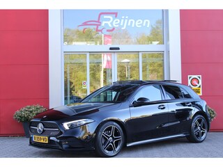 Mercedes-Benz A-klasse 180 BUSINESS SOLUTION AMG | PANORAMA SCHUIF/KANTEL DAK | SFEER VERLICHTING | ELEKTRISCH VERSTELBARE VOORSTOELEN MET GEHEUGEN FUNCTIE | STOEL VERWARMING OP BEIDE VOORSTOELEN | MULTIBEAM LED KOPLAMPEN | ACHTERUITRIJ CAMERA | APPLE CARPLAY/ANDROID AUTO | NAVIGATIE | KEYLESS GO | CRUISE CONTROL | NIGHT PAKKET | VERKEERSLICHTEN WEERGAVE | 17" LICHTMETALEN VELGEN AMG | HEMELBEKLEDING ZWART | MBUX MULTIMEDIA SYSTEEM | SPORTSTOELEN | PARKEERSENSOREN VOOR + ACHTER |