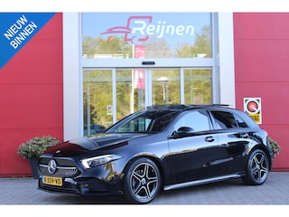 Mercedes-Benz A-klasse 180 BUSINESS SOLUTION AMG | PANORAMA SCHUIF/KANTEL DAK | SFEER VERLICHTING | ELEKTRISCH VERSTELBARE VOORSTOELEN MET GEHEUGEN FUNCTIE | STOEL VERWARMING OP BEIDE VOORSTOELEN | MULTIBEAM LED KOPLAMPEN | ACHTERUITRIJ CAMERA | APPLE CARPLAY/ANDROID AUTO | NAVIGATIE | KEYLESS GO | CRUISE CONTROL | NIGHT PAKKET | VERKEERSLICHTEN WEERGAVE | 17" LICHTMETALEN VELGEN AMG | HEMELBEKLEDING ZWART | MBUX MULTIMEDIA SYSTEEM | SPORTSTOELEN | PARKEERSENSOREN VOOR + ACHTER |