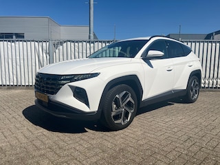 Hyundai Tucson 1.6 T-GDI PHEV 265pk Comfort Smart 4WD | Climate | Camera | Carplay | Keyless | Navigatie | Full - Led | Elek. Klep | Winterpakket | 19" Lichtmetaal | Krell Audio | Digitale Cockpit | Parkeer Assistent | Adapt. Cruisecontrol