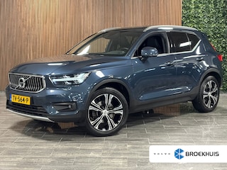 Volvo XC40 T4 Aut. Inscription Luxury | Full Option! | Schuifdak | Trekhaak | 360° Camera | All Season banden | Harman Kardon | Bestuurdersstoel elektrisch geheugen | Adaptieve Cruise Control | Full LED meesturende koplampen | Standkachel met Volvo On Call App | Stoelverwarming voor+achter | Stuurwielverwarming | Passagiersstoel elektrisch | Pilot Assist | BLIS Dode Hoek Detectie | Lederen bekleding | Zitting verlenging voorstoelen | 19 Inch | Keyless Drive | Parkeersensoren voor+achter | Privacy Glass | Elektrisch bedienbare achterklep | Climate Control L+R | Alarm Klasse III | Breestralers in voorbumper | Automatisch dimmende binnen en buitenspiegels | DAB Radio | Apple Carplay/Android Auto | Draadloos telefoon opladen | Volvo On Call met mobiele App functie | Denim Blue Metallic |