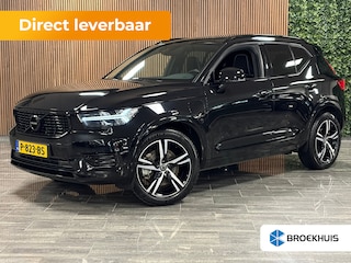 Volvo XC40 T5 Recharge R-Design | Schuifdak | Trekhaak | Onderkant mee gespoten incl. black pack | Adaptieve Cruise Control | Stoel en Stuurwielverwarming | Pilot Assist | Parkeercamera | Leder/alcantara R-Design bekleding met wit stiksel en bies | Zitting verlenging voorstoelen | 19 Inch | Keyless Drive | Parkeersensoren voor+achter | Privacy Glass | Elektrisch bedienbare achterklep | Climate Control L+R | Automatisch dimmende binnen en buitenspiegels | Regensensor | DAB Radio | Apple Carplay/Android Auto | Draadloos telefoon opladen | Volvo On Call met mobiele App functie | Onyx Black Metallic |