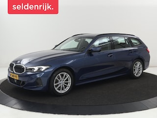 BMW 318i | Leder | Adaptive cruise | Stoelverwarming | Memory | Live Cockpit | Sportstoelen | Carplay | Keyless | Trekhaak | Parkeerhulp | Climate control | Full LED | Origineel NL