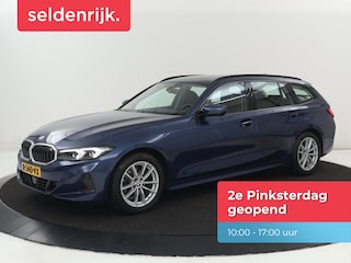 BMW 318i | Leder | Adaptive cruise | Stoelverwarming | Memory | Live Cockpit | Sportstoelen | Carplay | Keyless | Trekhaak | Parkeerhulp | Climate control | Full LED | Origineel NL