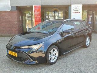 Toyota Corolla Touring Sports 1.8 Hybrid ACTIVE TREKHAAK 4S-BANDEN APPLE/ANDROID CAMERA NAVI AD-CRUISE CLIMA NL-AUTO 16'' LM-VELGEN