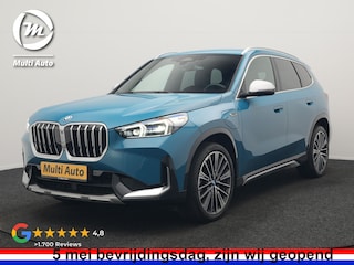 BMW X1 xDrive30e X Line PHEV 327pk Dealer O.H. | Camera | Lederen Sportstoelen & Stuur Verwarmd | Sfeerverlichting | Apple Carplay | Blis | Keyless | Navigatie | DAB | Cruise Control | 20"L.M | Plug In Hybrid |