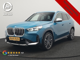 BMW X1 xDrive30e X Line PHEV 327pk Dealer O.H. | Camera | Lederen Sportstoelen & Stuur Verwarmd | Sfeerverlichting | Apple Carplay | Blis | Keyless | Navigatie | DAB | Cruise Control | 20"L.M | Plug In Hybrid |