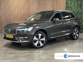 Volvo XC60 T6 AWD Recharge Plus Bright | Trekhaak | 360° Camera | Harman Kardon | Adaptieve Cruise Control | Standkachel met Volvo On Call App | Stoelverwarming voor+achter | Stuurwielverwarming | Schuifdak | Full LED meesturende koplampen | Pilot Assist | Elektrische voorstoelen geheugen | Lederen bekleding | Zitting verlenging voorstoelen | 19 Inch | Google Infotainment | Keyless Drive | Parkeersensoren voor+achter | Privacy Glass | Elektrisch bedienbare achterklep | DAB Radio | Apple Carplay/Android Auto | Draadloos telefoon opladen | Volvo On Call met mobiele App functie | Platinum Grey Metallic |