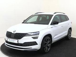 Skoda Karoq 1.5 TSI ACT Sportline Business | CANTON audio | Achteruitrijcamera | Cruise control | CarPlay | Keyless | Navigatie | Stoel- en stuurwielverwarming |