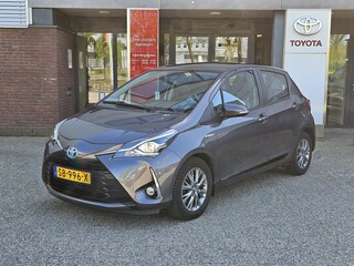 Toyota Yaris 1.5 Hybrid DESIGN NAVI CRUISE CLIMA CAMERA BLUETOOTH 15'' LM-VELGEN NL-AUTO