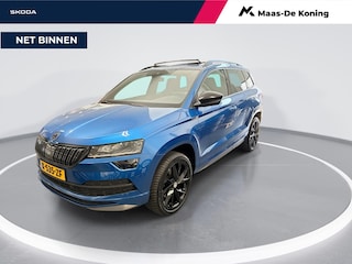 Skoda Karoq 1.5 TSI 150pk DSG Sportline Business · Panoramadak · Camera · Stuur- & Stoelverwarming · Trekhaak · Canton Audio · Dodehoeksensor · Keyless ·
