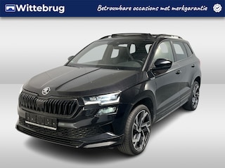 Skoda Karoq 1.5 TSI ACT Sportline / AUTOMAAT/ PANO/ TREKHAAK/ DCC/ STUUR+STOELVERWARM./ ACC/ PARK.SENSOR.V+A/ CAMERA/ SMARTLINK/ KEYLESS/ DIGITAL DASH/ NAVI/ DAB/ CLIMA/ LED/ 19'' LMV