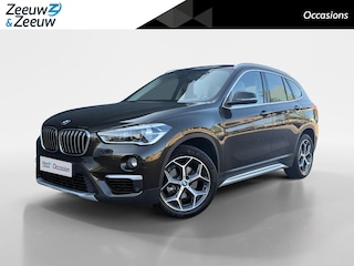 BMW X1 sDrive18i High Executive | Achteruitrijcamera | Lederen bekleding | Head Up Display | Stoelverwarming | Elektr. Achterklep | 12 maanden garantie! |