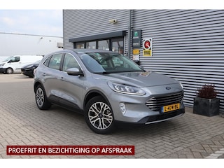 Ford Kuga 2.5 PHEV Titanium 1e Eigenaar | Volledig Onderh | BTW | NAP | SOH91% | Trekhaak | 2 Kabels | Carplay | Navi | Cruise | DAB | Keyless | Bots | PDC