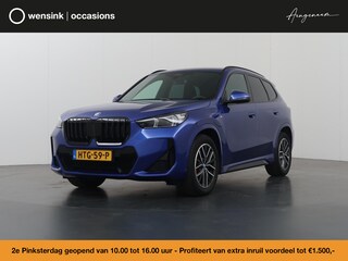 BMW X1 xDrive25e | M-Pakket | Curved Display | Sportstoelen | Camera | DAB | Apple Carplay/Android Auto | Ele. kofferdeksel | BMW LED |
