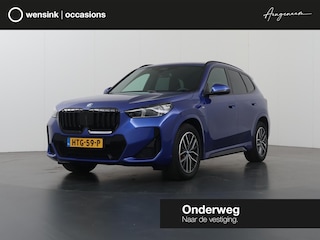 BMW X1 xDrive25e | M-Pakket | Curved Display | Sportstoelen | Camera | DAB | Apple Carplay/Android Auto | Ele. kofferdeksel | BMW LED |
