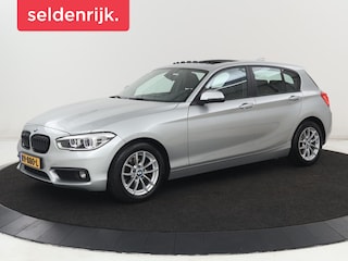 BMW 118i Executive | Schuifdak | Leder | Stoelverwarming | Camera | Full LED | Navigatie | Parkeerhulp | Climate control | Bluetooth | Cruise control