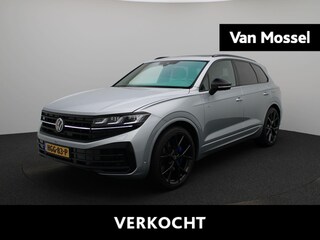 Volkswagen Touareg 3.0 TSi eHybrid 4MOTION R Origineel Nederlands | 1e Eigenaar | Luchtvering | Comfort Pakket | Multimedia Pakket | Trekhaak elektrisch inklapbaar incl. Trailer Assist' | Zijruiten van gelaagd veiligheidsglas; geluiddempend; achterruit en zijruiten achter getint | Servosluiting portieren