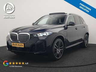 BMW X5 xDrive50e M Sport PHEV 490pk Dealer O.H. | Panodak Sky Lounge | Luchtvering | Head Up | 360 Camera | Harman / Kardon | Lederen Sportstoelen Memory & Verwarmd | Apple Carplay | Keyless | Blis | 22"L.M | Plug In Hybrid |