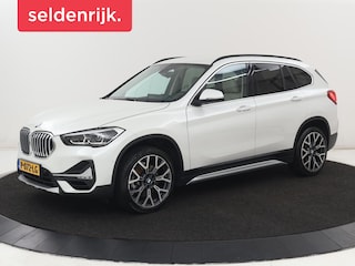 BMW X1 sDrive20i Business Edition Plus | Leder | Head-Up | Trekhaak | Stoelverwarming | Carplay | Sfeerverlichting | Full LED | Navigatie | Sportstoelen | Climate control | Parkeerhulp | Cruise control
