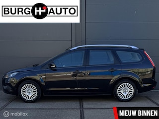 Ford Focus Wagon 1.8 Titanium Flexi Fuel - ECC - NAVI - CRUISE CONTROLE - TREKHAAK - PARKEERSENSOREN - BLUETOOTH - VERWARMDE VOORRUIT - LM VELGEN - NL AUTO - NAP - NIEUWE APK BIJ AFLEVERING -