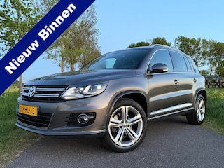 Volkswagen Tiguan 2.0 TSI Sport&Style 4Motion R-Line Automaat | 2e Eigenaar | Navi | 18" Velgen | Trekhaak | Stoelverwarming | LED