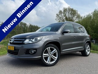 Volkswagen Tiguan 2.0 TSI Sport&Style 4Motion R-Line Automaat | 2e Eigenaar | Navi | 18" Velgen | Trekhaak | Stoelverwarming | LED