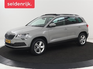 Skoda Karoq 1.5 TSI Business Edition | Panoramadak | Stoelverwarming | Carplay | Navigatie | Parkeerhulp | Climate control | Bluetooth | Cruise control | Getint glas