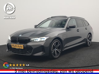 BMW 3-serie Touring 330e M Sport PHEV 293pk Dealer O.H. | Dravitgrau | Trekhaak Af Fabriek | Panodak | Head Up | Camera | Lederen Sportstoelen Verwarmd | Sfeerverlichting | Apple Carplay | Keyless | Blis | Cruise Control | Navigatie | DAB | Plug I