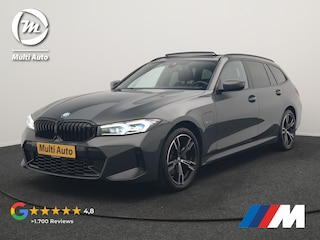 BMW 3-serie Touring 330e M Sport PHEV 293pk Dealer O.H. | Dravitgrau | Trekhaak Af Fabriek | Panodak | Head Up | Camera | Lederen Sportstoelen Verwarmd | Sfeerverlichting | Apple Carplay | Keyless | Blis | Cruise Control | Navigatie | DAB | Plug I