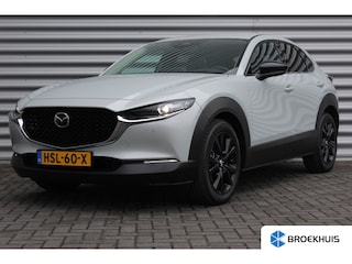 Mazda CX-30 2.5 e-SKYACTIV-G M HYBRID 140PK HOMURA AUTOMAAT / NAVI / CLIMA / FULL-LED / PDC / 18" LMV / KEYLESS / AFN. TREKHAAK / WINTERPAKKET / ADAPT. CRUISECONTROL / 1E EIGENAAR / NIEUWSTAAT !!