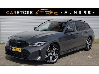 BMW 3-serie Touring 330e*M-Pakket*Dak*Trekhaak*140Dkm*Keyless*2023*Dravit Grau*INDIVIDUAL*