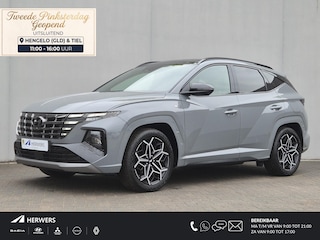 Hyundai Tucson 1.6 T-GDI 4wd N Line Sky 4WD / Dealer onderhouden / Fabrieksgarantie tot 03-2027 / Trekhaak afneembaar / Panorama schuifdak / Trekgewicht 1650 kg / Navigatie / Apple Carplay Android / Elektrische achterklep / Stuur- Stoel & Achterbank verwarming / Rondomzicht camera /