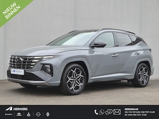 Hyundai Tucson 1.6 T-GDI 4wd N Line Sky 4WD / Dealer onderhouden / Fabrieksgarantie tot 03-2027 / Trekhaak afneembaar / Panorama schuifdak / Trekgewicht 1650 kg / Navigatie / Apple Carplay Android / Elektrische achterklep / Stuur- Stoel & Achterbank verwarming / Rondomzicht camera /
