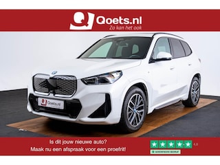 BMW iX1 eDrive20 67 kWh M Sport - Panoramadak - Driving Assistant Plus - Head up - Getinte ruiten - Comfort Access - Elektrisch verwarmde voorstoelen - sportstoelen - Grootlichtassistent -