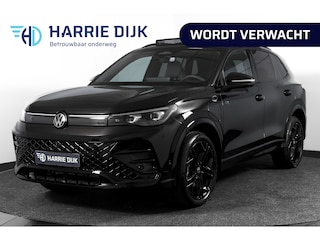 Volkswagen Tiguan 1.5 eHybrid R-Line Edition 272 PK | Black Style | 15 inch Navi | Elek. Trekhaak | IQ Light | S/K-Panodak | Dig. Cockpit | Adapt. Cruise | Stoel-+Stuurverw. | 360 Camera | NAV + App. Connect | ECC | Elek. Klep | LM 20" |