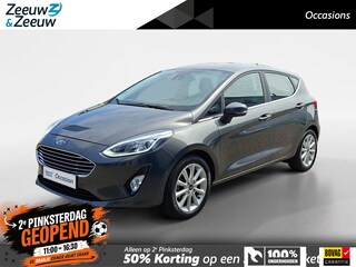 Ford Fiesta 1.0 EcoBoost Titanium | Dealeronderhouden | Stoel- stuur en voorruitverwarming | Navigatie | Trekhaak | All season banden