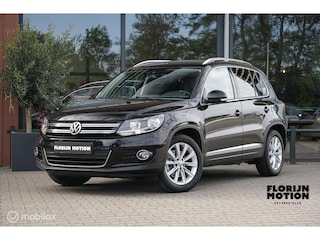 Volkswagen Tiguan 1.4 TSI Sport&Style | Vol lederen interieur | Trekhaak | schermen in. hoofdsteunen | lage km | Getint glas | Cruise | Climate
