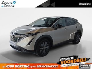 Nissan Ariya Evolve 66 kWh | 22KW Lader| Afneembare trekhaak| Apple carplpay& Android auto| 360grd Camera| Stoelverwarming en verkoeling| Elektrisch verstelbare stoelen| Luxe bekleding| Dealer onderhouden|