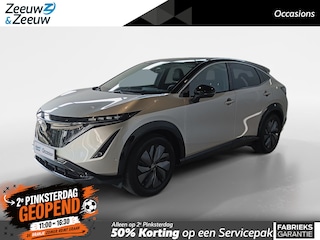 Nissan Ariya Evolve 66 kWh | 22KW Lader| Afneembare trekhaak| Apple carplpay& Android auto| 360grd Camera| Stoelverwarming en verkoeling| Elektrisch verstelbare stoelen| Luxe bekleding| Dealer onderhouden|