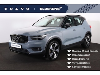 Volvo XC40 T4 Recharge R-Design IntelliSafe Assist - Adaptieve LED koplampen - Elektr. bedienb. bestuurdersstoel met geheugen - Parkeercamera achter - Verwarmde voorstoelen & stuur - Parkeersensoren voor & achter - Verwarmbare voorruit - Draadloze tel. lader - Semi elektr. inklapbare trekhaak - 19' LMV