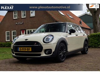 Mini Clubman 1.5 Cooper Business Edition Aut. | Panorama | Sportstoelen | Harman-Kardon | Engelse Achterlichten | Historie |