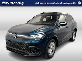 Volkswagen Tiguan 1.5 eHybrid R-Line / AUTOMAAT/ 272 PK/ GARANTIE TM 06-2030/ PANO/ TREKHAAK/ STOELVENTILATIE/ 360 CAMERA/ DODEHOEK/ ACC/ MEMORY SEAT/ STUUR+STOELVERWARM./ MASSAGE/ HARMAN KARDON/ ELEK.ACHTERKLEP/ APP-CONNECT